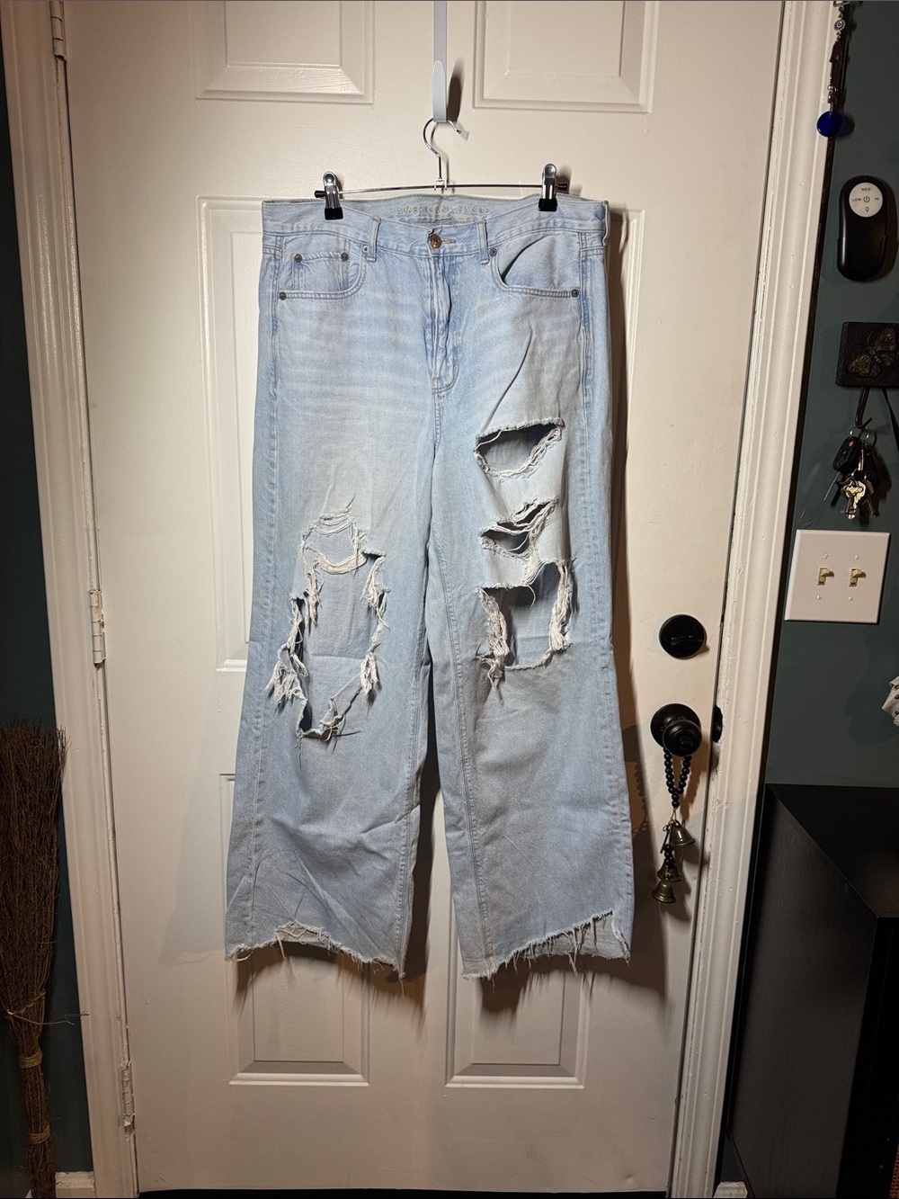 Light Wash Distressed Wide Leg Jeans - Women